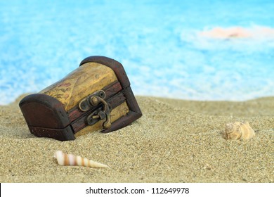 Closed Treasure Chest On A Beach