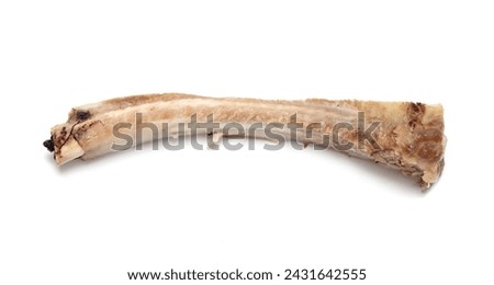 Closed view of a pile of bones after dinner with leftover meat.