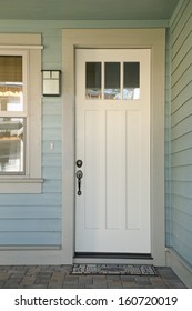 Closed White Front Door Of A House During Daytime