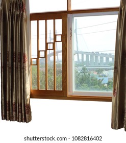 closed window overlooking the cable-stayed bridge in Saigon (Vietnam)