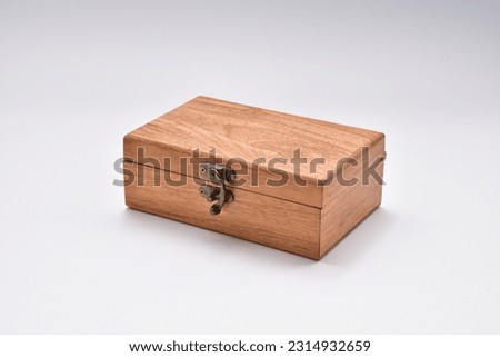 closed wooden box.empty wooden box white background.wooden box isolated white background.wood box.Wood chest of jewelry.Thai handmade wood chest.