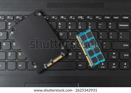 Closed-up view of PC computer RAM and SSD disk drive. Laptop upgrade concept