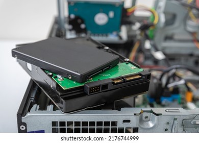 Closed-up view of SSD and spindle hard disks on top of business desktop PC