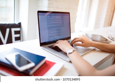 Closely Woman Blogger Keyboarding On Laptop Computer, Sitting In Coffee Shop. Female Professional Writer Typing Promotional Text On Notebook. Student Learning Online Via Netbook. Blogging Web Site 