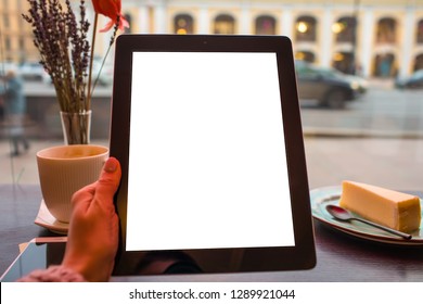 Closely Woman Writer Holding Modern Touch Pad Computer With Empty Mock Up Copy Space Screen While Sitting In Coffee Shop With Cup Of Cappuccino And Sweet Desert During Recreation In Holidays 