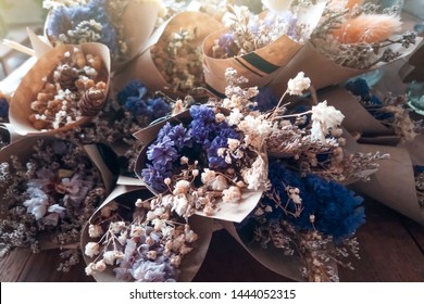 Closeop Dried Flowers In A Bouquet Of Paper Flowers. Vintage Color Tone