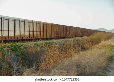 Closer View Of The Border Wall Between USA And Mexico