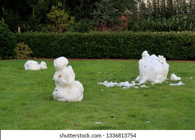 Closer View On Melting Snow Man On A Lawn In Niederlangen Emsland Germany Photographed In Winter At A Fantastic Day  