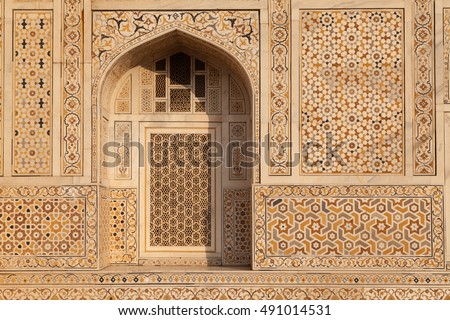 Closer view of white marble detail of the tomb of Baby Taj, located in Agra, India. Built between 1622 and 1628, it represents a transition between the first phase of monumental Mughal architecture.