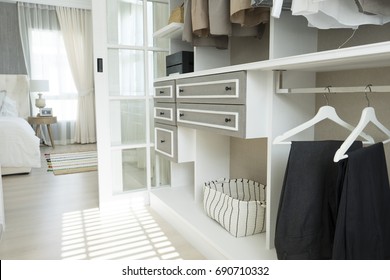 closet with cloth and shelf at home