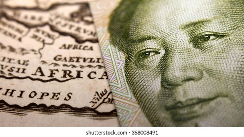 Close-up Of A 1 Yuan Chinese Banknote (figuring Mao) On Top Of A Map Of Africa