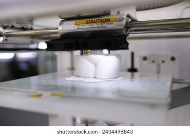 Closeup, 3d printer and prototype in lab for tech, creative and design in digital robot innovation. Printing, machine and model to process, robotic and material in prototyping breakthrough project