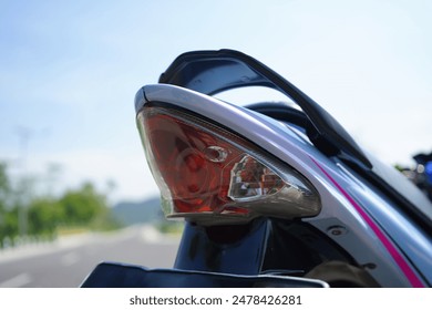 closeup, 4-Stroke underbone motorcycle taillight - Powered by Shutterstock