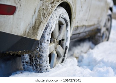 Closeup Of 4x4 Vehicle Wheels In The Snow