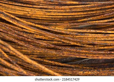 Close-up Abstract Of Rusty Steel Wire Roll, Taken In Shallow Depth Of Field, Industry And Construction Concept Background