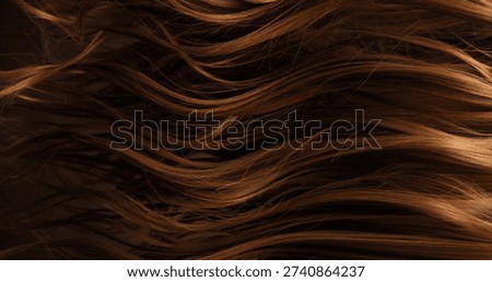 Close-up abstract texture of flowing brown hair forming elegant natural waves and curves. Organic motion, soft light and rich tones create a cinematic beauty background or luxury visual element.