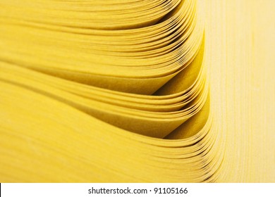 Close-up abstract view of yellow pages book