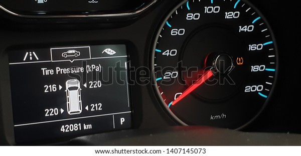 Closeup\
activated TPMS (Tire Pressure Monitoring System) monitoring display\
on vehicle cluster, Check tire\
pressure.