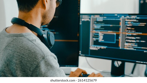 Closeup Adult Asia male, female freelance typing write prompt AI bot IT app smart program nomad, video game, terminal with coding language, user interface, designer, big data center desktop computer.