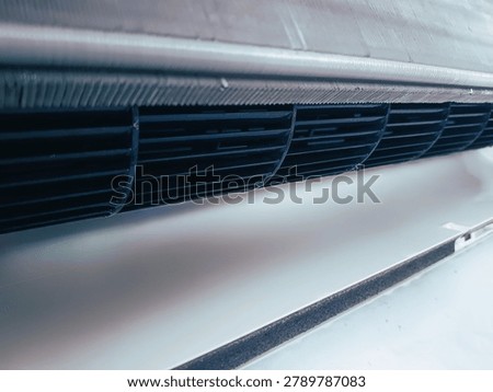 Close-Up of Air Conditioner Internal Components and Cross-Flow Fan Blower Wheel