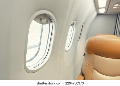 Closeup Aircraft Passenger Cabin Interior Windows Seat Row. Aeroplane Round Safety Glass Window.