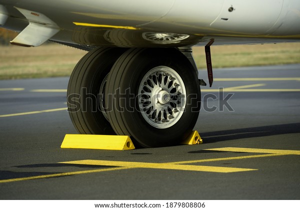 close-up of an airplane\
landing gear