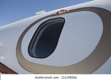 Closeup Of An Airplane Window From Outside