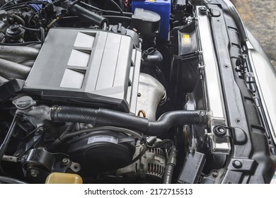 Close-up Of An Aluminum Car Radiators In Engine Bay.