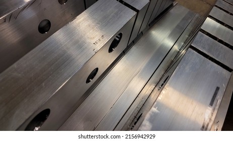 A Closeup Of Aluminum Extrusions In A Manufacturing Facility