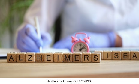 Close-up of alzheimer word collected with wooden blocks in row. Alzheimers disease, progressive neurologic disorder and dementia concept - Shutterstock ID 2177328207
