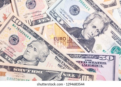 Closeup lot of american dollar and euro banknotes, cash. Concept leap, fall, rate, currency exchange, debt, profit, loss, sanctions, appreciation of goods, inflation