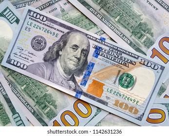 Closeup American dollars banknote. One hundred dollar banknote. earning money & saveing money Concept. - Shutterstock ID 1142631236