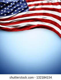 Closeup Of American Flag On Blue Background