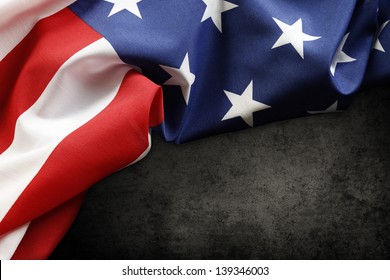 Closeup Of American Flag On Dark Background