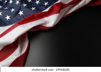 Closeup Of American Flag On Dark Background