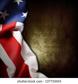 Closeup Of American Flag On Grunge Background