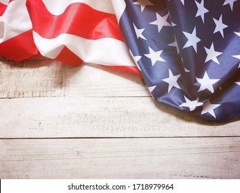 Closeup of American flag on vintage wood for 4th of July holiday background, filter effect. Happy flag day.