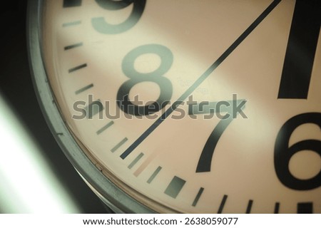 A close-up of an analog clock showing the second hand at 37 seconds, positioned between the 7 and 8 — symbolizing the rhythm of passing time.