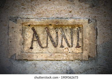 Closeup Of An Ancient Roman Stone Plaque With The Text In Latin Language Anni (Years In English Language). Ostia Antica, Near Rome, Latium, Italy, Europe.