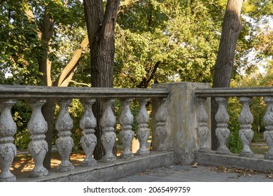 Close-up Ancient Stone Railings. Old Classic Balustrade. Disrupted Stairs. Details Of The Architecture.