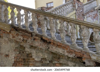 Close-up Ancient Stone Railings. Old Classic Balustrade. Disrupted Stairs. Details Of The Architecture.