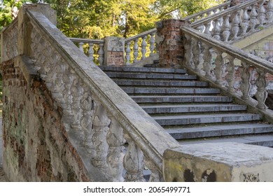 Close-up Ancient Stone Railings. Old Classic Balustrade. Disrupted Stairs. Details Of The Architecture.