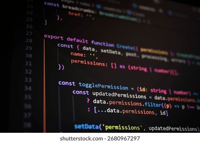 Close-up of application code on dark mode editor screen, showcasing software development, web app programming, and modern coding workflow in tech industry.