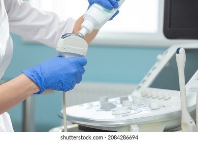 Closeup of the application of medical gel on the ultrasound diagnostic sensor. The doctor is preparing for the ultrasound procedure - Powered by Shutterstock