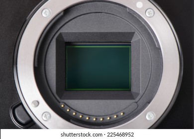 closeup of APS-C image sensor in mirrorless camera