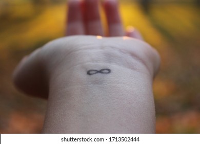 infinity tattoos on wrist