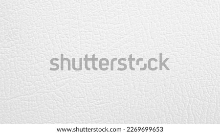 Closeup artificial leather white colour for texture background.  top view.