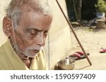 Closeup of Asian eighty plus senior man. Very old man with emotions, Grandfather, Portrait, aged, elderly senior.