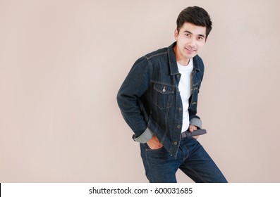 Closeup Asian Man Casual Outfits Standing In Jeans And Black Denim Shirt, Men Black Hair And Short Hair, Smiling And Wearing Jeans Jacket, Beauty And Fashion Concept, And Jeans Concept