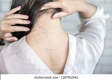 Closeup Asian Woman Back With Problem Hair Loss Falling On Neck Behide And Shoulder 